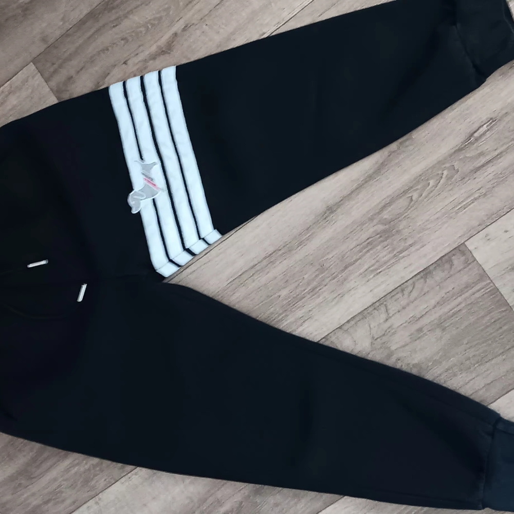 Thom Browne Black Sweatpants with Tapered Fit